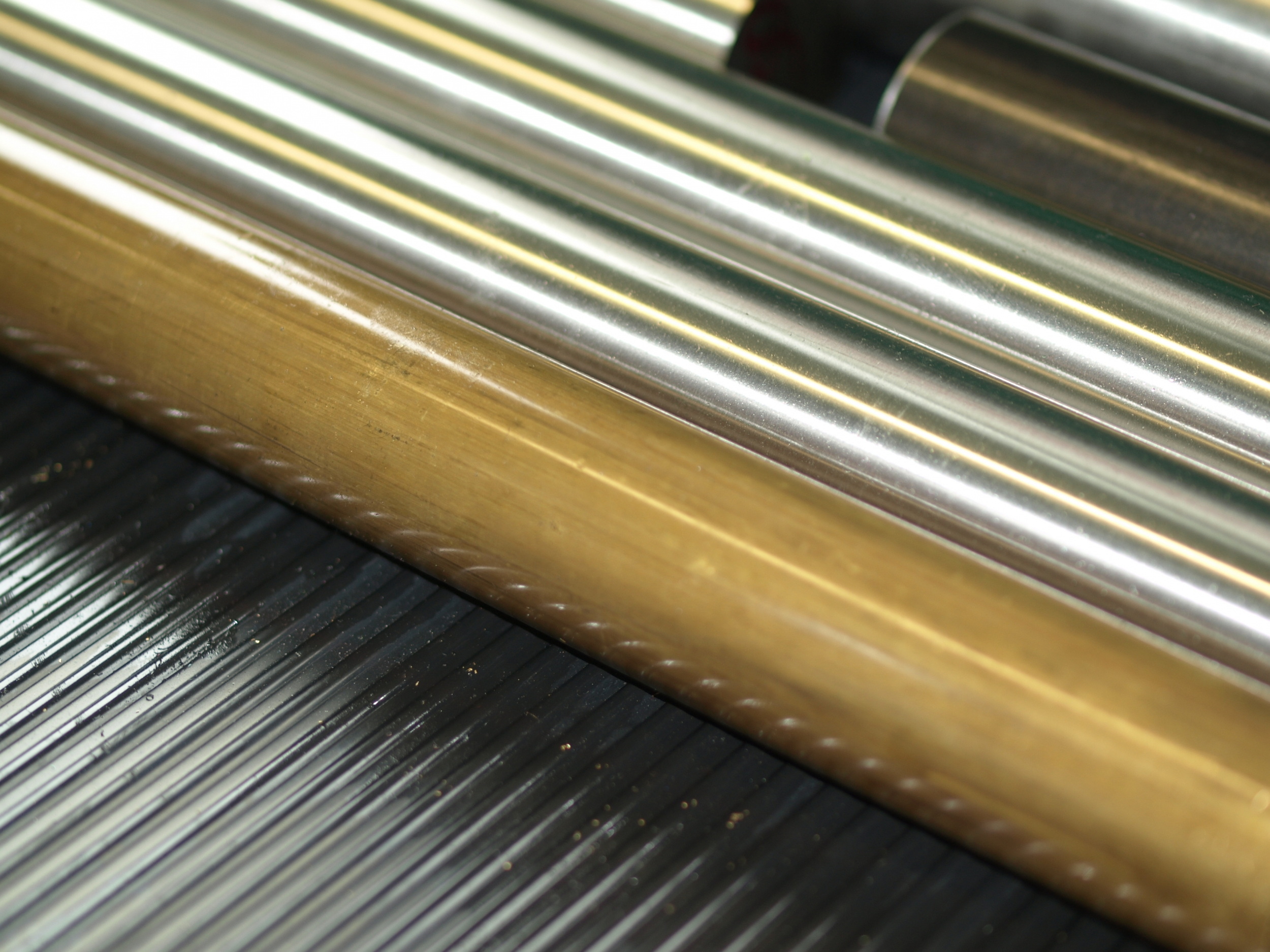 Metal rods for watch cases and bezels