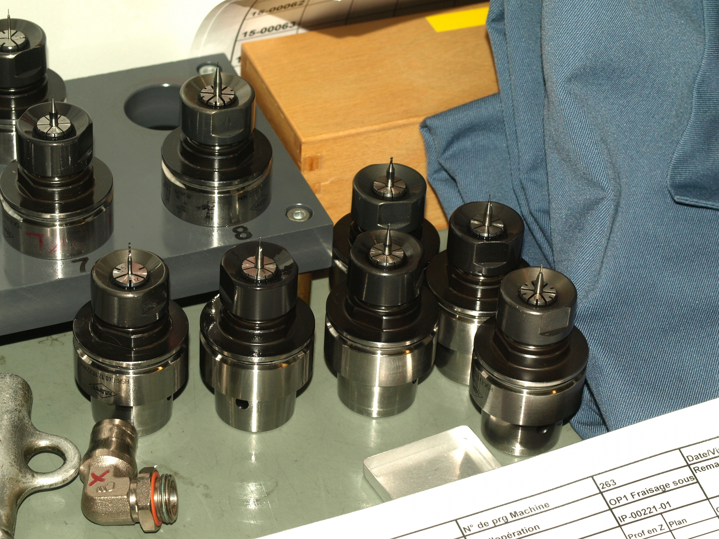 Drill bits used to mill watch hands on automated CNC machine