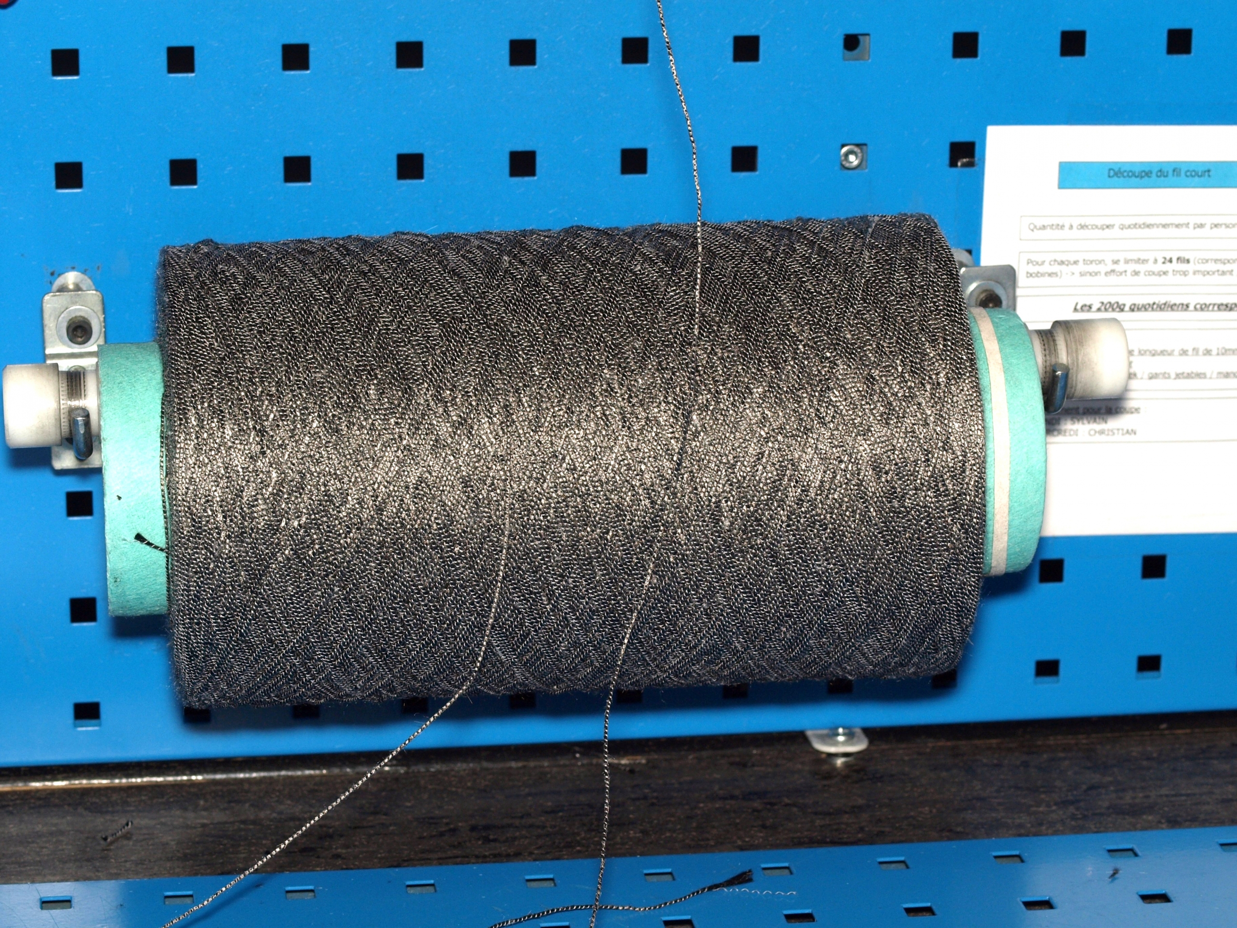 Roll of raw carbon fiber thread