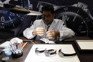 Glashutte Original watchmaker making adjustments at WatchTime