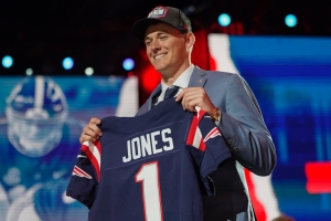 Mac Jones wearing Cartier Santos yellow gold on 2021 NFL Draft night