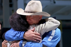 Jeff Bezos wearing Omega Speedmaster Moonwatch Professional Blue Origin