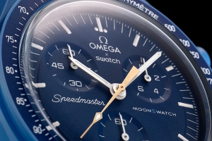 MoonSwatch Mission to Neptune MoonShine Gold dial closeup
