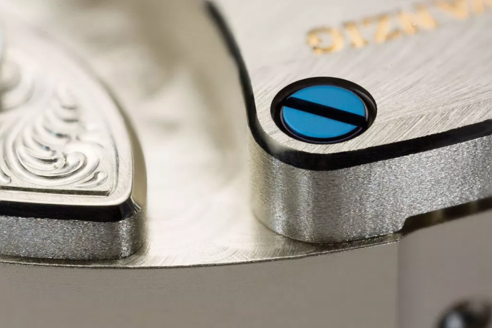 Watchmaking contour grinding