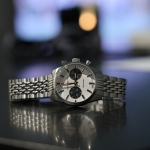 Nivada Grenchen Datomaster on a reflective surface