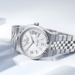 Rolex Land-Dweller Oystersteel Ref. 127334 front laying on side