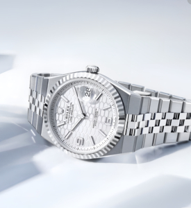 Rolex Land-Dweller Oystersteel Ref. 127334 front laying on side