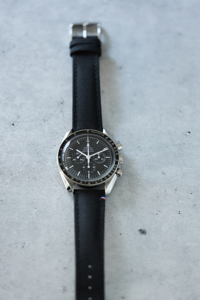 Speedmaster Moonwatch overhead flat lay
